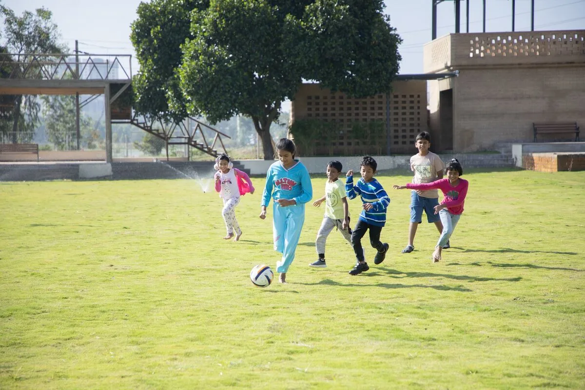 Children playing sports at Vidyan Earth School
